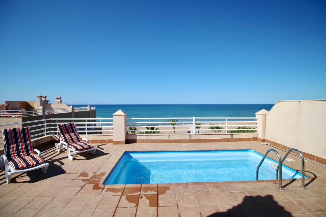 Ático espectacular con piscina privada en primera línea de playa Apartamento Dénia Quarto foto